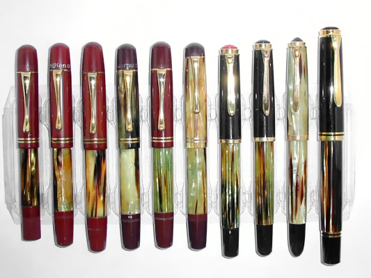 From the collection of Rick Propas/photography by Rick Propas. Tray of Pelikan pens in tortoise. Circa 1934-1987.